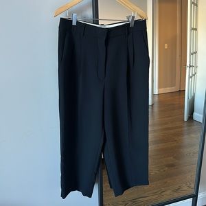 Aritzia Effortless Pant. Cropped length. Size 12. Black crepette material.